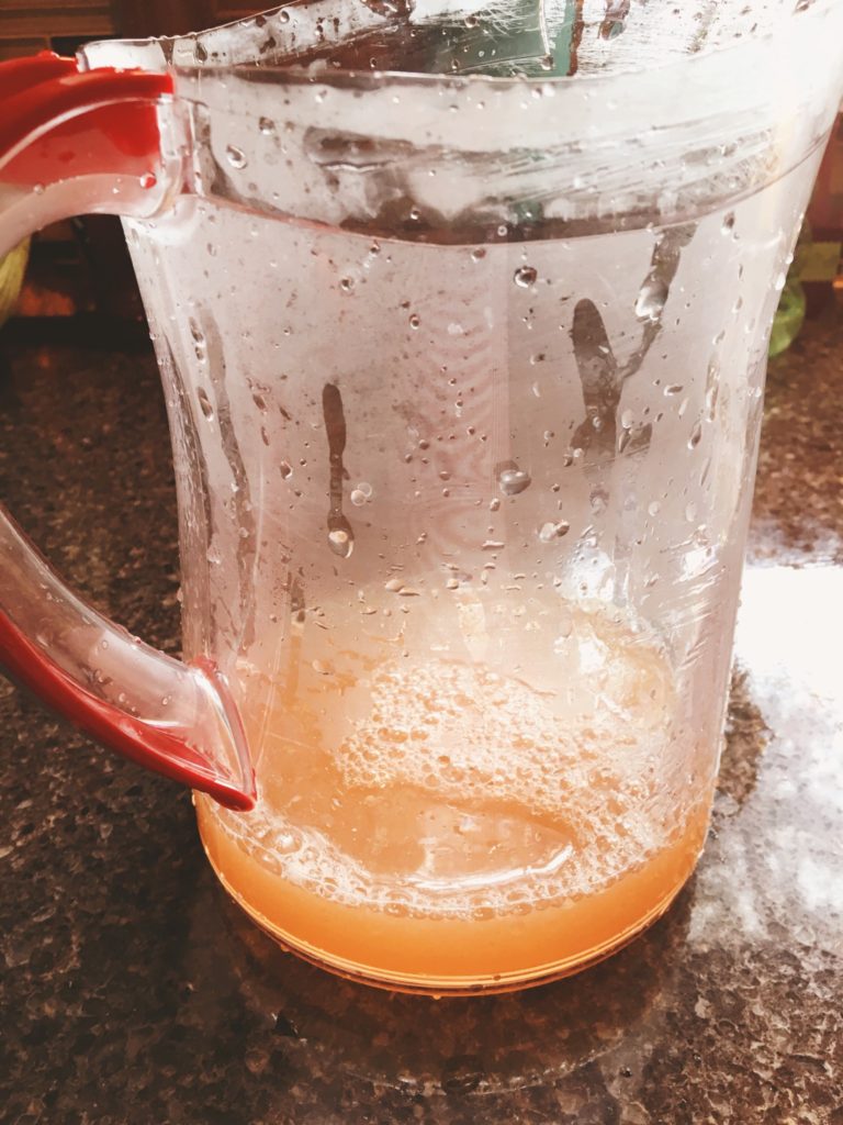 Lemon and Peach juice in pitcher. 