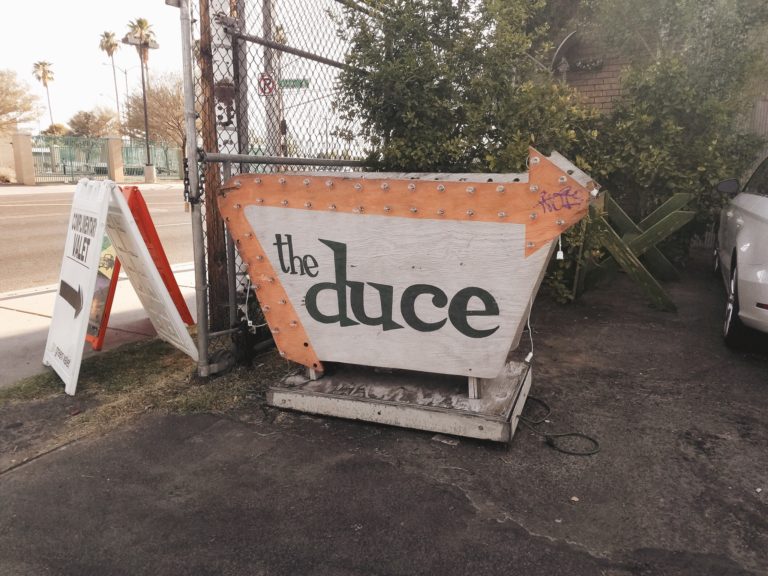 The Duce sign