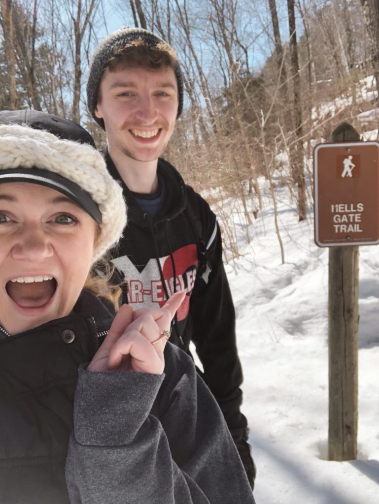 Dylan and Hannah by Hells Gate Trail sign